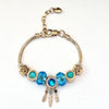 Aestify™ Aqua Dream Charm Bracelet – 18K Gold Tone | Premium CZ + Crystal Charms