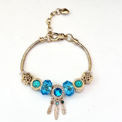 Aestify™ Aqua Dream Charm Bracelet – 18K Gold Tone | Premium CZ + Crystal Charms