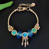Aestify™ Aqua Dream Charm Bracelet – 18K Gold Tone | Premium CZ + Crystal Charms