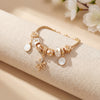 Aestify™ Crystal Bloom Charm Bracelet – 18K Gold Tone