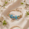 Aestify™ Aqua Dream Charm Bracelet – 18K Gold Tone | Premium CZ + Crystal Charms